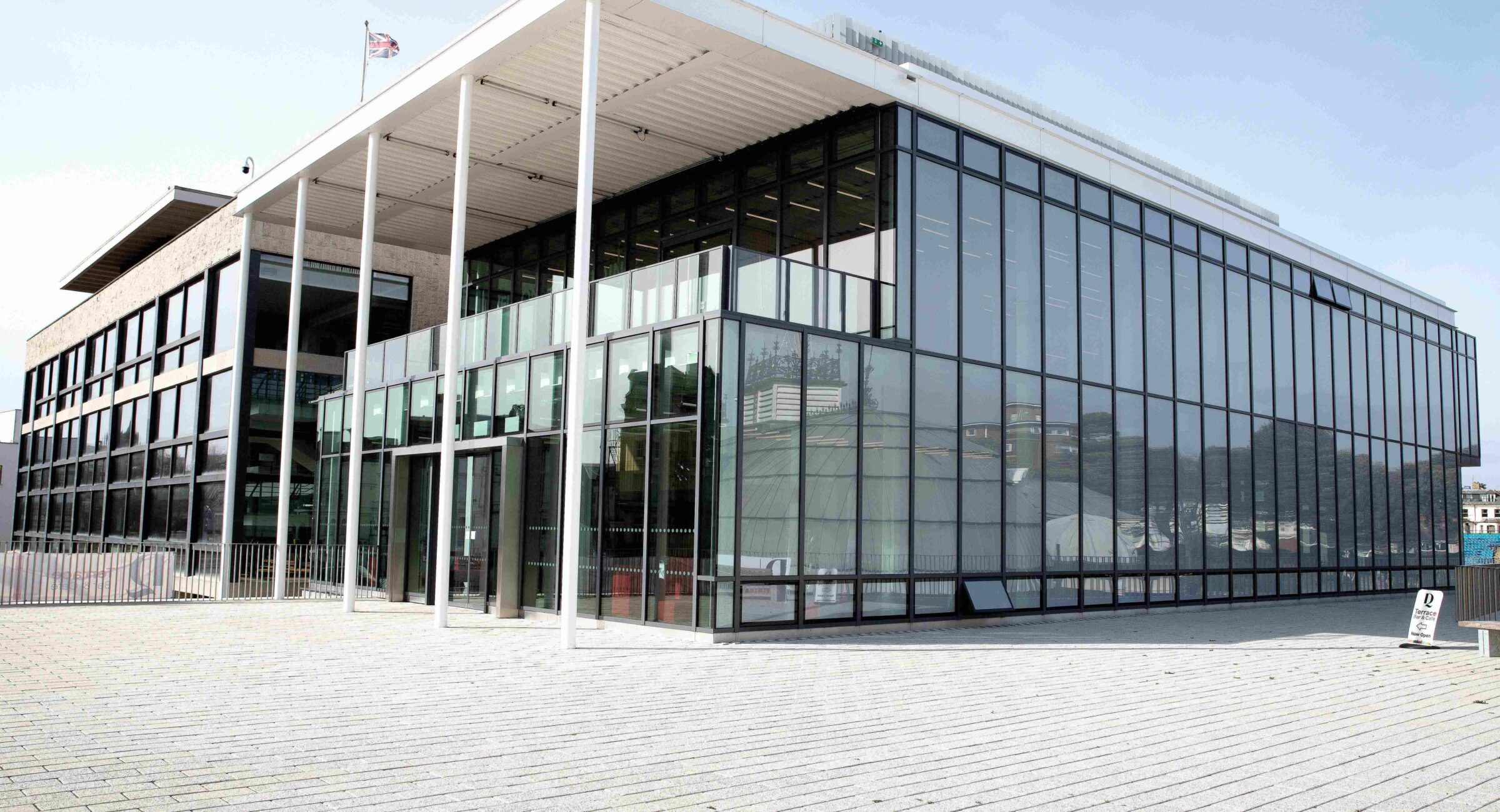 Exterior shot of Welcome building, a beautiful glass building.